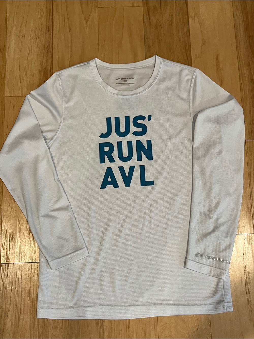 Brooks White Long Sleeve Shirt with Teal Blue 'JUS' RUN AVL' Graphic
